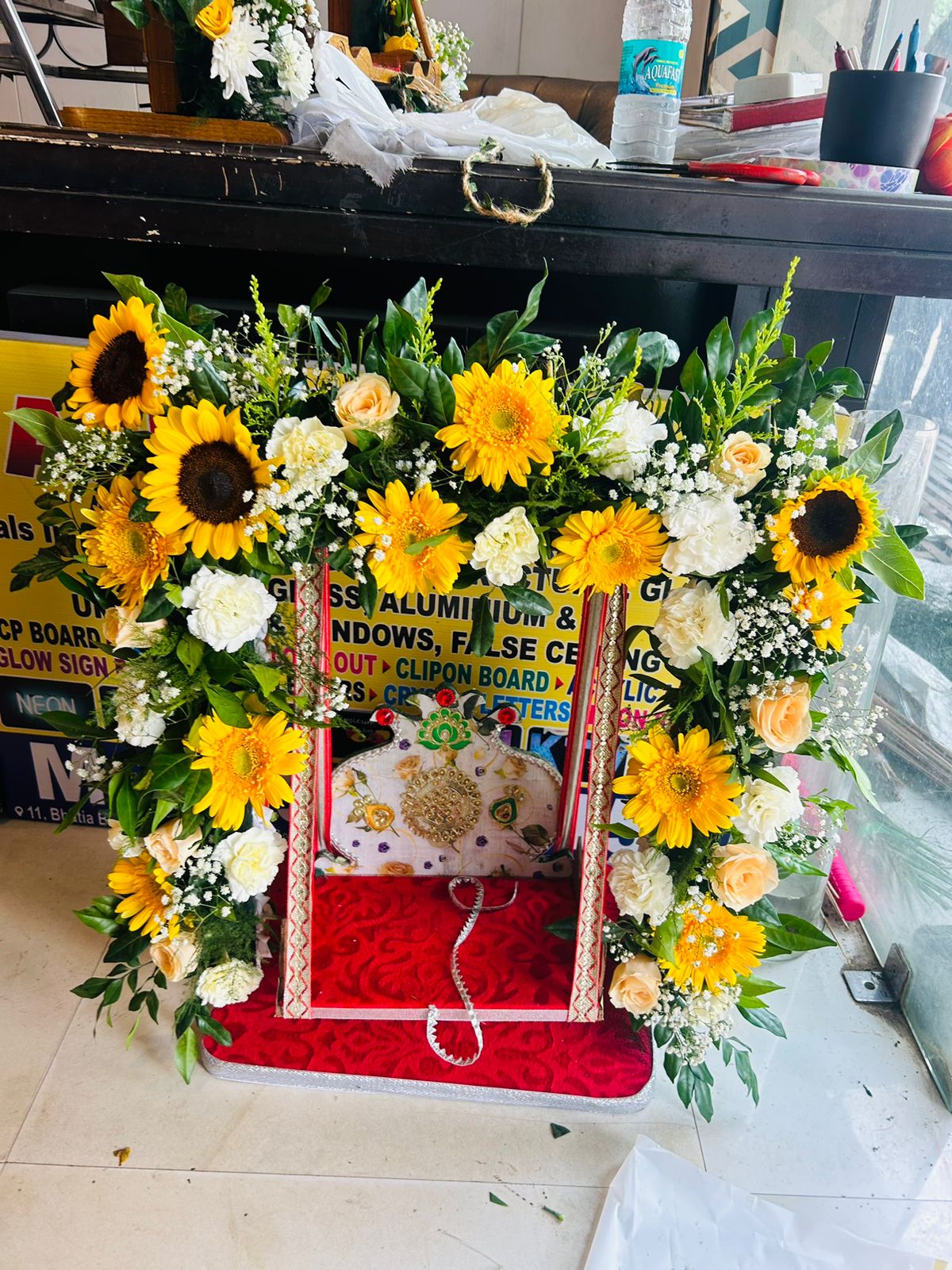 Sunflower and white flower small Janmashtami jhula decoration in Ghaziabad